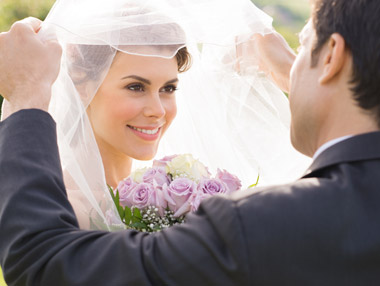 lifting the veil at wedding ceremony